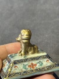 A fine Chinese gilt-decorated blue, white and famille rose covered censer, Qianlong