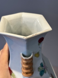 A pair of hexagonal Chinese famille rose 'hu' vases with floral design, Qianlong/Jiaqing