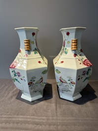 A pair of hexagonal Chinese famille rose 'hu' vases with floral design, Qianlong/Jiaqing