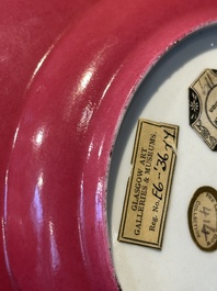 A fine Chinese famille rose 'ruby back' plate with a bird on a blossoming branch, Yongzheng