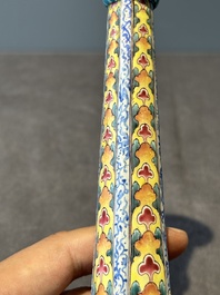 A pair of Chinese Canton enamel 'lotus' candlesticks, Yongzheng