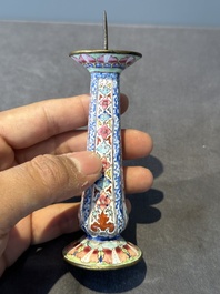 A pair of Chinese Canton enamel candlesticks with floral design, Yongzheng/Qianlong