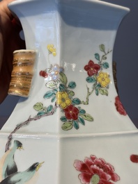 A pair of hexagonal Chinese famille rose 'hu' vases with floral design, Qianlong/Jiaqing
