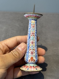 A pair of Chinese Canton enamel candlesticks with floral design, Yongzheng/Qianlong