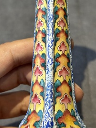 A pair of Chinese Canton enamel 'lotus' candlesticks, Yongzheng