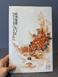 A fine Chinese iron-red and grisaille 'luohan' plaque, signed Wang Bu 王步, 20th C.