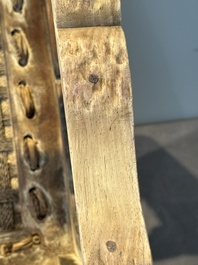 A Chinese rectangular huanghuali wooden stool with 'chilong' design, 17/18th C.