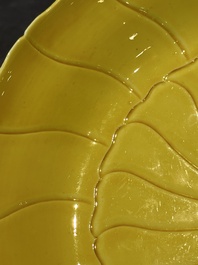 A Chinese yellow-glazed monochrome lotus-shaped dish, Yongzheng mark and of the period