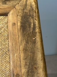 A Chinese rectangular huanghuali wooden stool with 'chilong' design, 17/18th C.