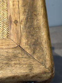 A Chinese rectangular huanghuali wooden stool with 'chilong' design, 17/18th C.