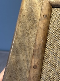 A Chinese rectangular huanghuali wooden stool with 'chilong' design, 17/18th C.