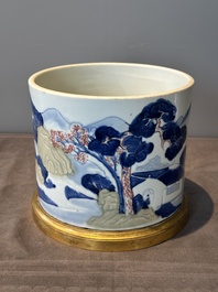 A large Chinese blue, white, celadon and copper-red brush pot on a later gilt bronze foot, 'bitong', Kangxi