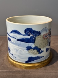 A large Chinese blue, white, celadon and copper-red brush pot on a later gilt bronze foot, 'bitong', Kangxi