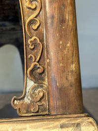 A Chinese rectangular huanghuali wooden stool with 'chilong' design, 17/18th C.