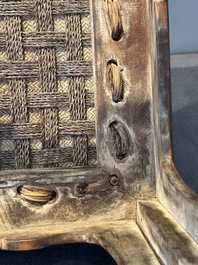 A Chinese rectangular huanghuali wooden stool with 'chilong' design, 17/18th C.