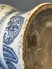 A blue and white Dutch Delft bottle-shaped chinoiserie vase with a lion, 17th C.
