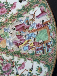 A large Chinese Canton famille rose dish and eight plates, 19th C.