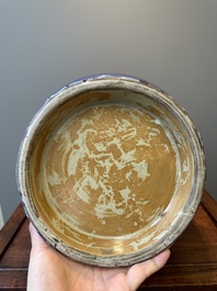 A large Chinese flamb&eacute; glaze 'hu' vase with Taotie handles, Qing