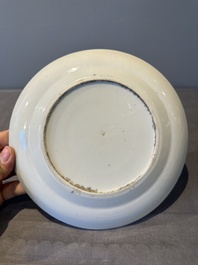 A large Chinese Canton famille rose dish and eight plates, 19th C.