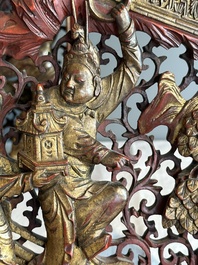 Two pairs of Chinese carved, lacquered and gilt-decorated wooden panels with figural design, 19th C.