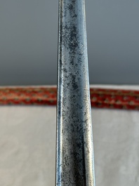 A collection of three daggers decorated with jade, silver and gold and an Indian mogul sword, India, 17/19th C.