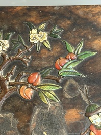 A square Chinese embellished and lacquered wooden box depicting a musician and two boys, Qing