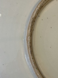 A large Chinese Canton famille rose dish and eight plates, 19th C.