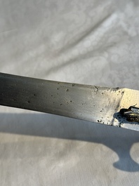 A collection of three daggers decorated with jade, silver and gold and an Indian mogul sword, India, 17/19th C.