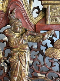 Two pairs of Chinese carved, lacquered and gilt-decorated wooden panels with figural design, 19th C.