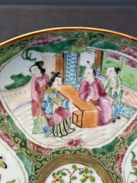 A large Chinese Canton famille rose dish and eight plates, 19th C.