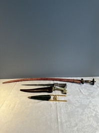 A collection of three daggers decorated with jade, silver and gold and an Indian mogul sword, India, 17/19th C.