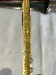 A collection of three daggers decorated with jade, silver and gold and an Indian mogul sword, India, 17/19th C.