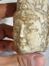 A Chinese marble head of Guanyin, Tang