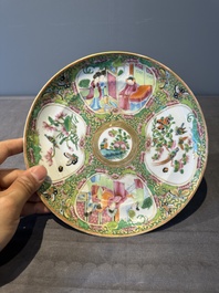 A large Chinese Canton famille rose dish and eight plates, 19th C.