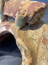A pair of Chinese polychrome-painted terracotta camels with saddles, Tang