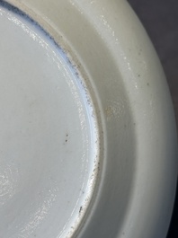 A large Chinese Canton famille rose dish and eight plates, 19th C.