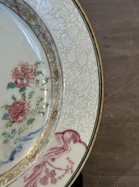 A pair of Chinese famille rose 'magpie and peony' plates with bianco-sopra-bianco rims, Yongzheng