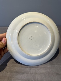 A large Chinese Canton famille rose dish and eight plates, 19th C.