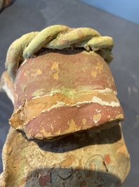 A pair of Chinese polychrome-painted terracotta camels with saddles, Tang
