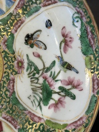 A large Chinese Canton famille rose dish and eight plates, 19th C.
