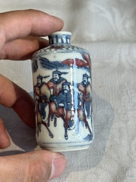 A Chinese blue, white and copper-red snuff bottle, Yongzheng mark, 19th C.