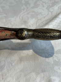A collection of three daggers decorated with jade, silver and gold and an Indian mogul sword, India, 17/19th C.