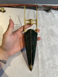 A collection of three daggers decorated with jade, silver and gold and an Indian mogul sword, India, 17/19th C.