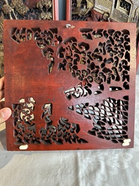 Two pairs of Chinese carved, lacquered and gilt-decorated wooden panels with figural design, 19th C.