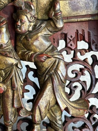 Two pairs of Chinese carved, lacquered and gilt-decorated wooden panels with figural design, 19th C.