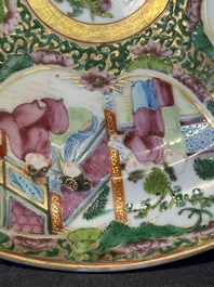 A large Chinese Canton famille rose dish and eight plates, 19th C.