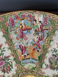 A large Chinese Canton famille rose dish and eight plates, 19th C.