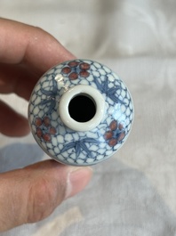 A Chinese blue, white and copper-red snuff bottle, Yongzheng mark, 19th C.
