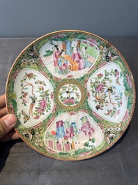 A large Chinese Canton famille rose dish and eight plates, 19th C.