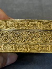 An oval Chinese imperial gold and silver filigree lidded 'dragon' box on reticulated stand and with presentation box, Qianlong mark and of the period